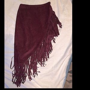 Express plum asymmetrical skirt with fringe